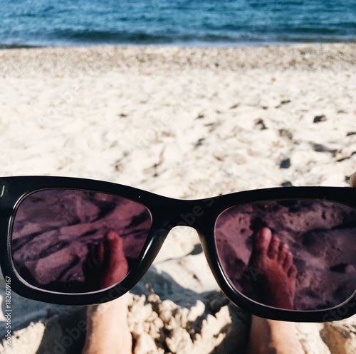 sunglasses on the beach photo