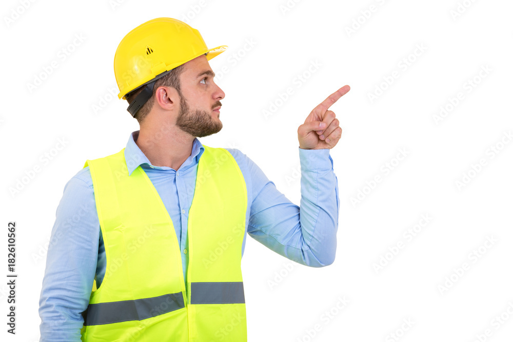 Happy professional engineer pointing to something isolated on white background.