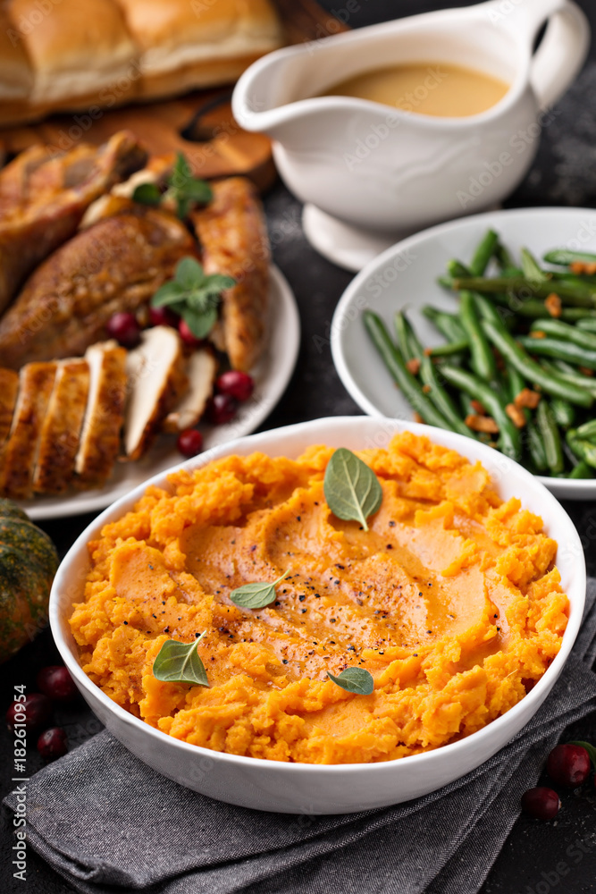 Mashed sweet potatoes on Thanksgiving table Mashed sweet potatoes on Thanksgiving table