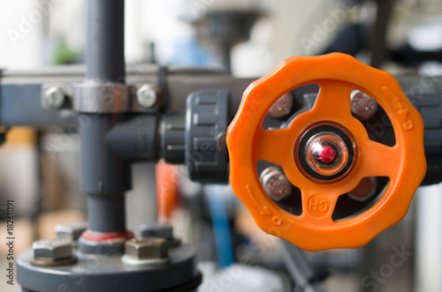 Orange ball valve on the plant chemical system
