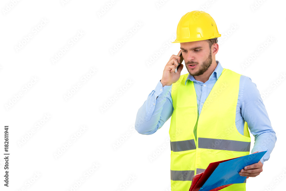 Angry upset young construction engineer yeling at the phone Angry upset young construction engineer yeling at the phone