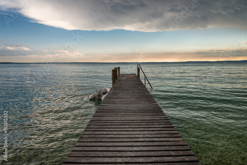 Lake Garda with wooden pier