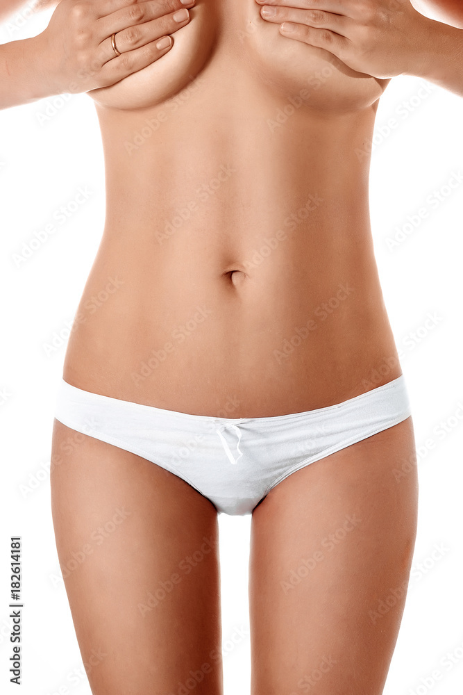 Perfect female body in white lingerie, isolated on white background. The concept of beauty, plastic surgery.