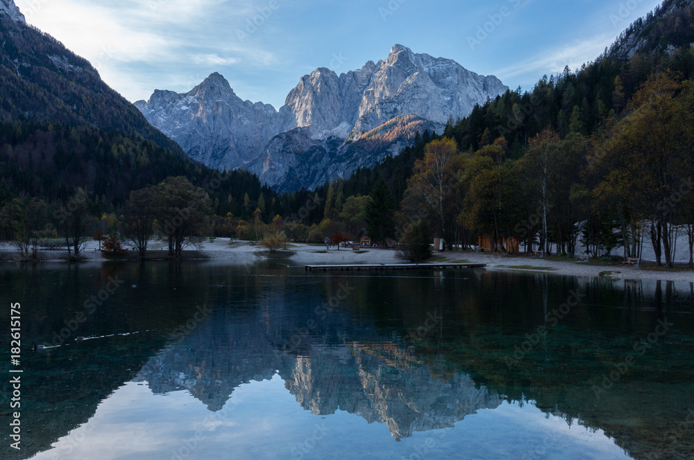 The rugged peaks of the Julian Alps seen from Lake Jasna