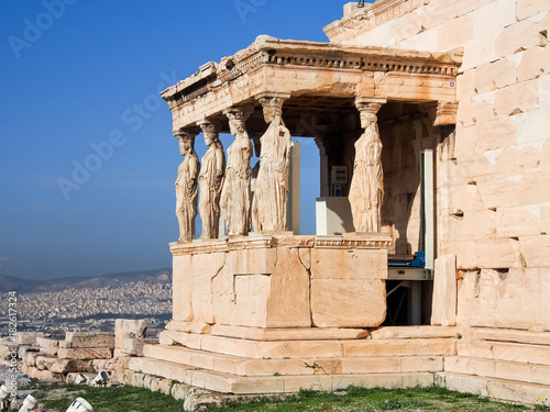 The Porch of Caryatids with greek statues for columns as part of the Erechtheion a top the Acropolis in Athens Greece