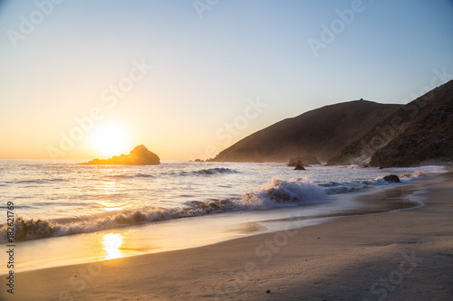 Large waves at Pfeiffer State Park, Big Sur, California at sunset