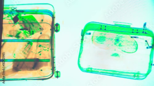 Various personal items from passengers scanned in the x-ray machine