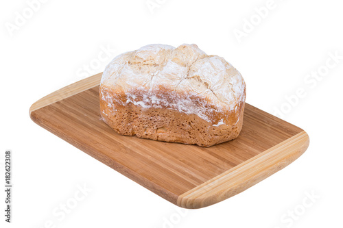Homemade white flour bread isolated on white background, baked in bread maker.