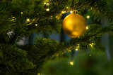 Christmas Tree Ball Ornament Festive Holiday Decoration Gold Closeup Depth of Field Bokeh