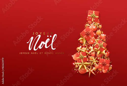 French text Joyeux Noel. Christmas greeting card. Creative composition in shape Xmas tree, with elegant stars and baubles balls, boxes gift.