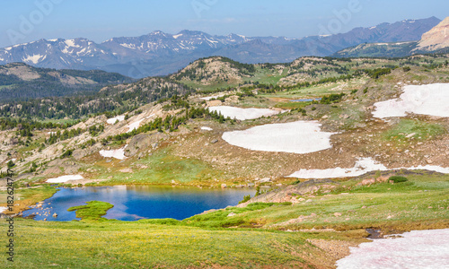 Alpine lake along the Beartooth Highway. Yellowstone Park, Peaks of Beartooth Mountains, Shoshone National Forest, Wyoming, USA. photo