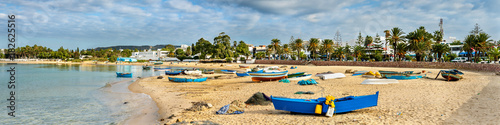 Wooden boats on the Mediterranean coast in Hammamet, Tunisia