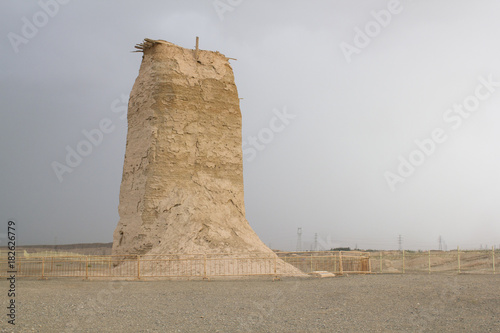 Kizilgaha Beacon Tower, one of the oldest but also best preserved watchtowers along the silk road installed in Han Dynasty, which provided security for traveling caravans. Xinjiang, China, July 2017. photo