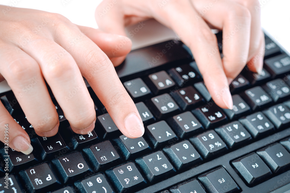 Hands typing on the keyboard Hands typing on the keyboard
