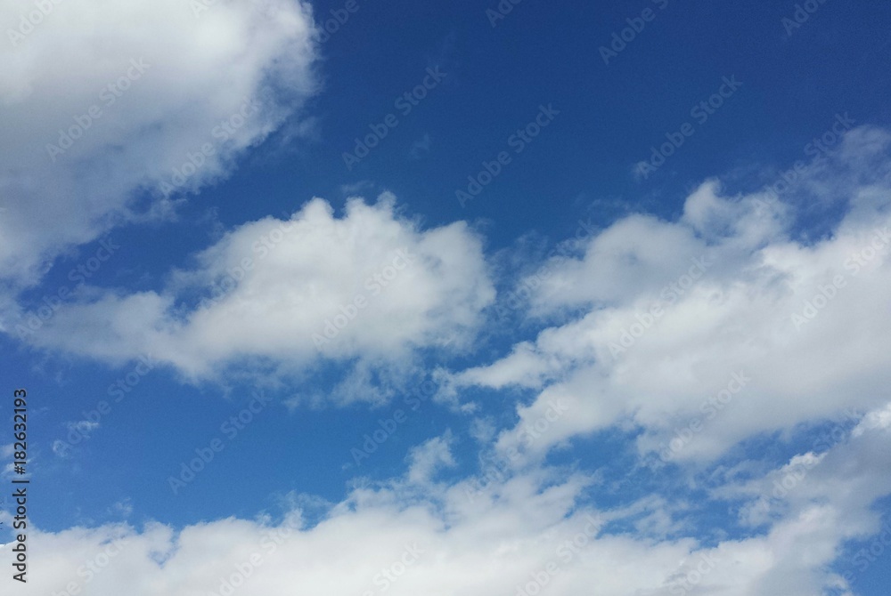 Beautiful clouds view on blue sky background 