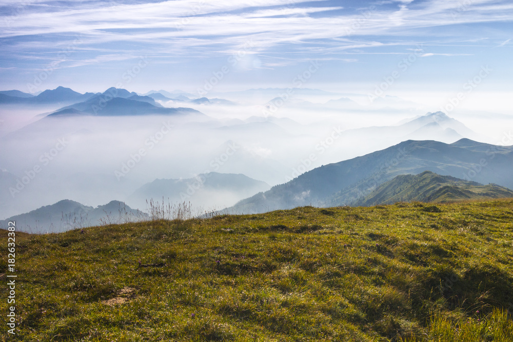 Foggy mountain view during hiking, Brescia province, Lombardy district, Italy