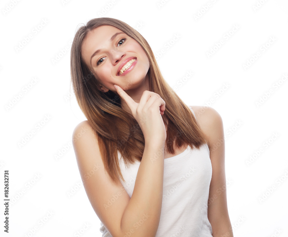 Young smiling blond girl on white background Young smiling blond girl on white background