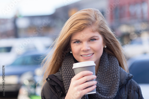 Teen with cup of coffee