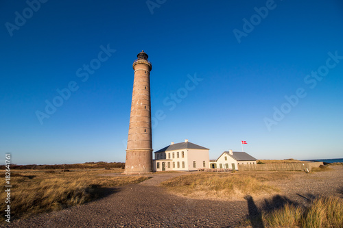 Skagen lighthouse in northern Denmark. The lighthouse was built in 1858 and with its 46m it is Denmarks second tallest.  photo