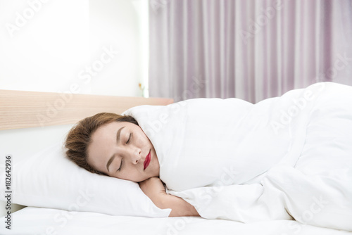 Portrait of asian woman sleeping on a pillow