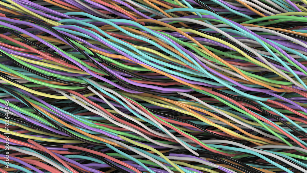 Twisted multicolored cables and wires on black surface