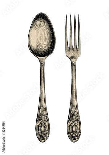 Vintage spoon and fork hand drawing,Spoon and fork sketch art isolate on white background photo