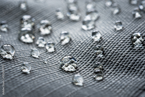 Waterproof coating background with water drops