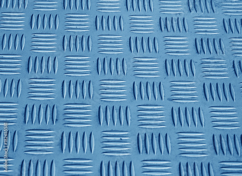 blue color metal floor pattern with blur effect.