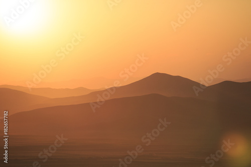 Mountains and prairies under the sun