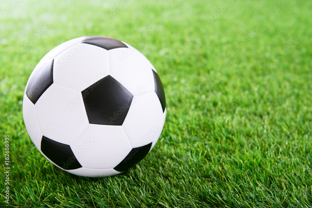 Soccer ball on green turf