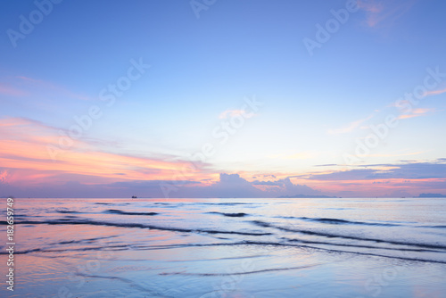 Sunset dramatic colorful tropical sea sky and cloud background,Long exposure image