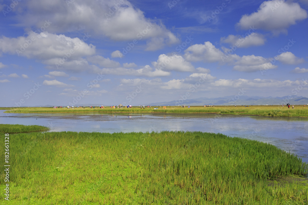Plateau lakes, blue sky, white clouds and wetlands Plateau lakes, blue sky, white clouds and wetlands