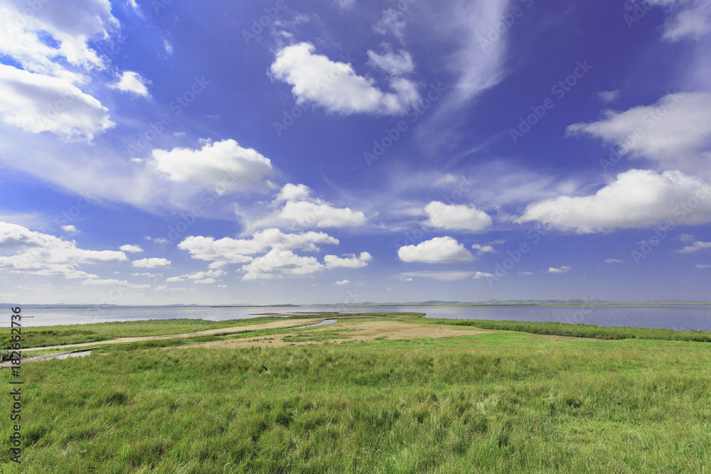 Plateau lakes, blue sky, white clouds and wetlands