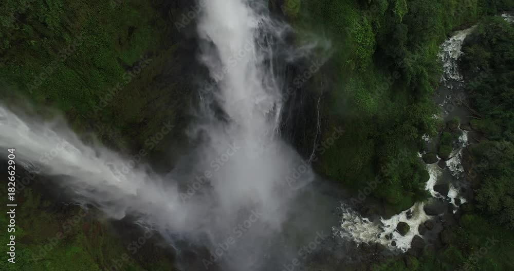 Video Beautiful waterfall. in southern Laos.It is a place to visit the natural beauty.Mountain forest waterfall landscape.Top view,Aerial view,waterfall amazing nature background,Rainforest Video Beautiful waterfall. in southern Laos.It is a place to visit the natural beauty.Mountain forest waterfall landscape.Top view,Aerial view,waterfall amazing nature background,Rainforest