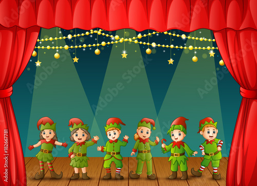 Christmas elves performing on stage