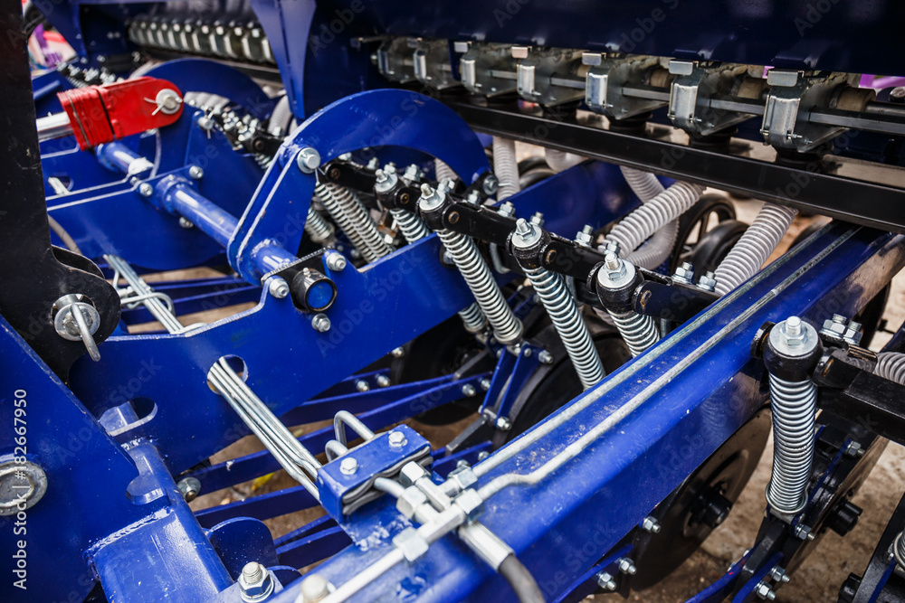 Fototapeta premium Mechanism of modern agricultural combine seeder, agricultural technology 