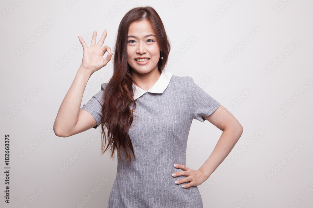 Young Asian woman show OK sign. Young Asian woman show OK sign.