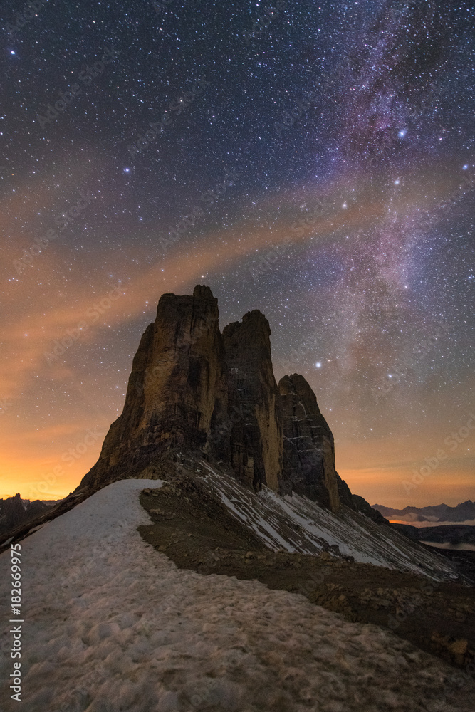 Alps Mountain landscape with night sky and Mliky way, Tre Cime di Lavaredo, Dolomites