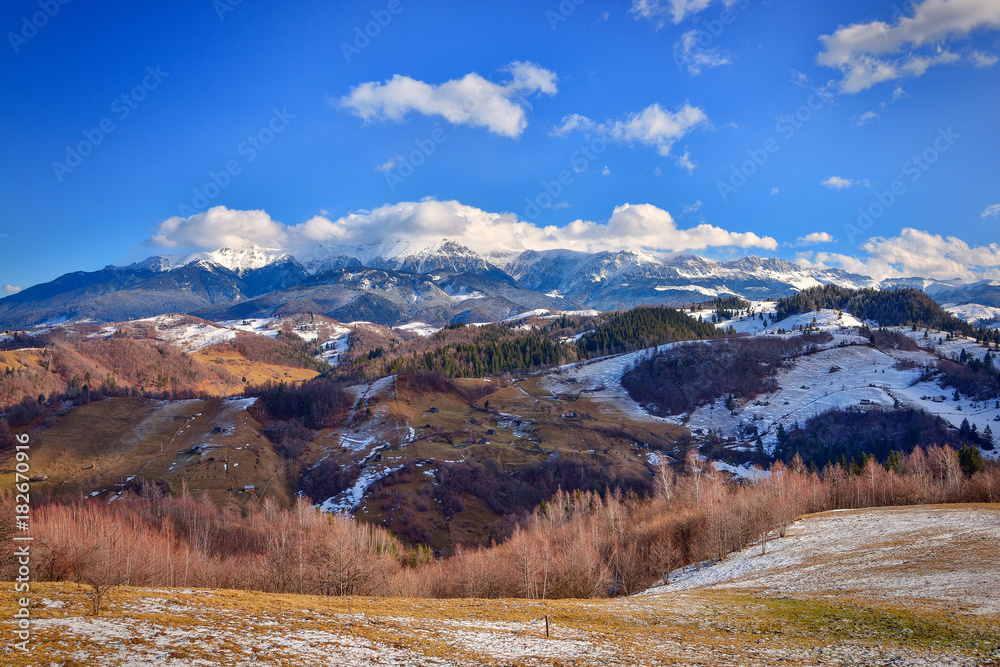 Romanian winter landscape in Carphatians Mountain.The rural winter landscape in the Bran area, Moeciu, Romania
