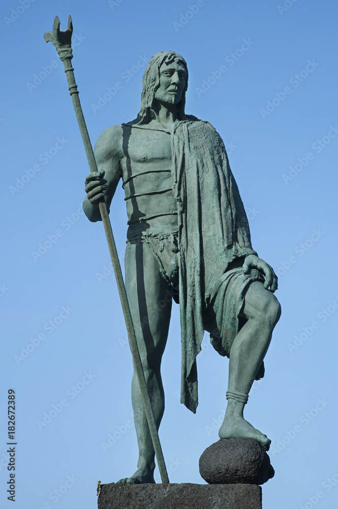 Statue of Tegueste, a Guanche chief or a mencey, part of the nine statues of pre-Hispanic kings situated in Plaza de la Patrona de Canarias, in Candelaria, Tenerife, Canary Islands, Spain
