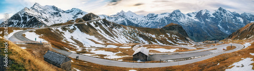 Panoramic view of Scenic High Alpine Road Pass in Austria or Grossglockner Hochalpenstrasse in autumn at sunset photo