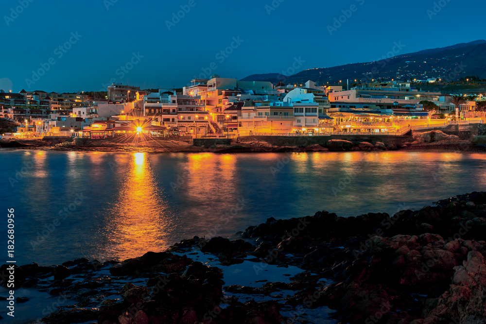 Panoramic view of  La Caleta de Adeje village in the night time , Tenerife,Canary Islands,Spain.