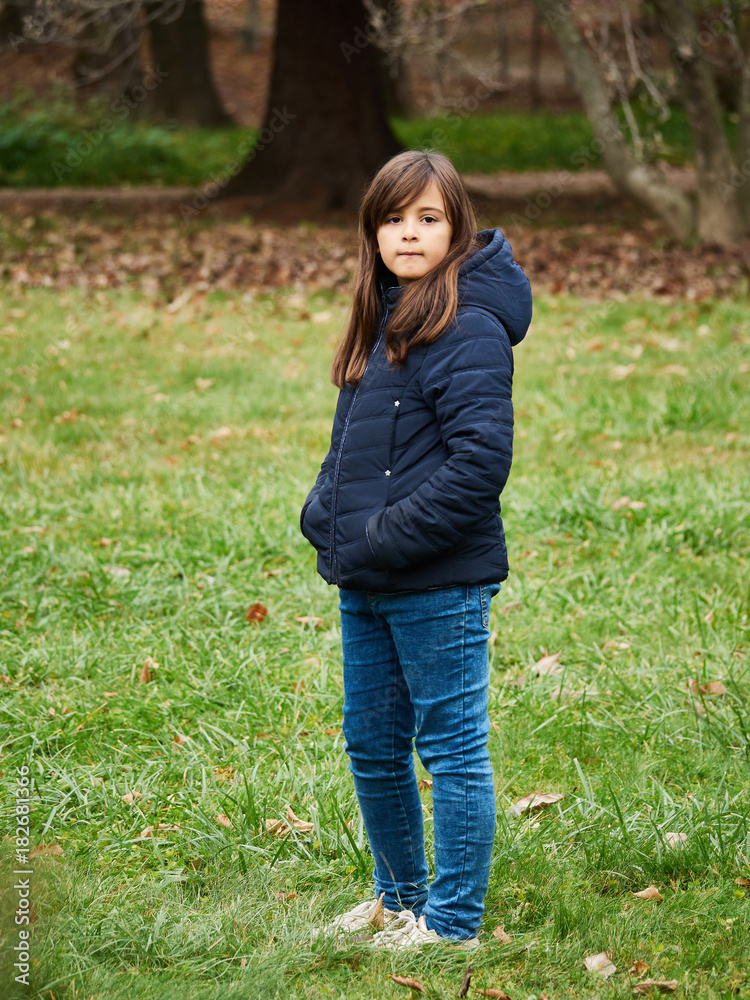 A beautiful girl in the park on a sunny day of autumn A beautiful girl in the park on a sunny day of autumn