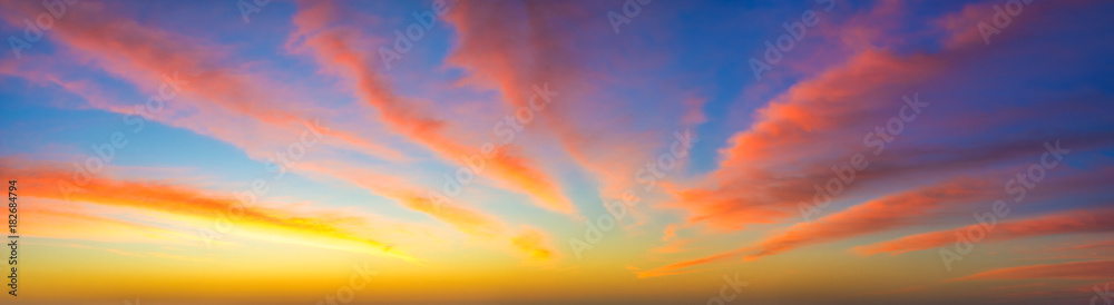 Spectacular, colorful sky during sunset, panorama, only clouds and sky