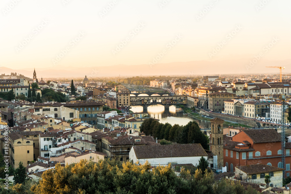 Florence, ITALY - October, 2017: Beautiful cityscape skyline of Firenze, Italy, with the bridges over the river Arno