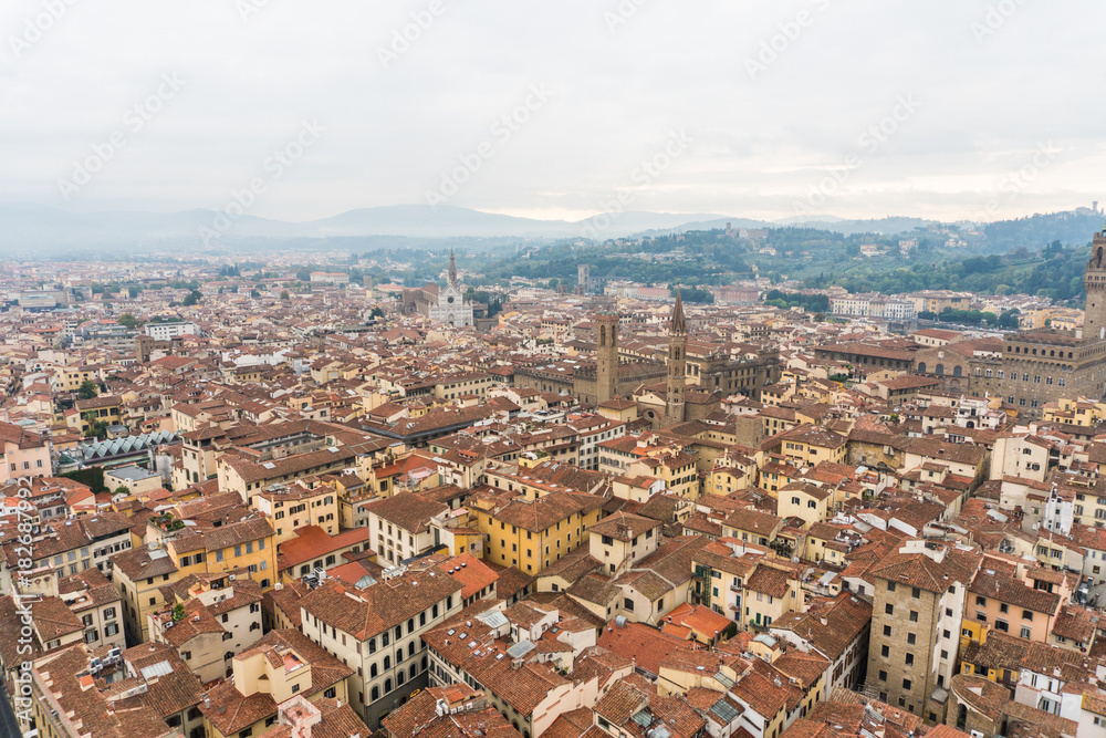 Florence, ITALY - October, 2017: Florence or Firenze aerial foggy cityscape.