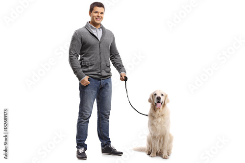 Guy with a labrador retriever dog