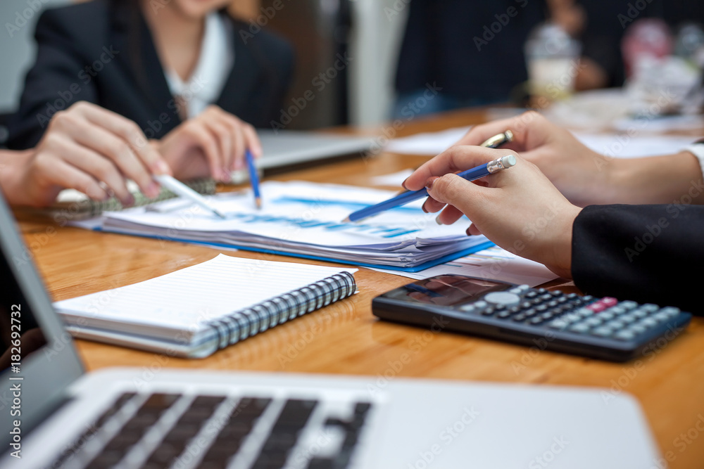 Fototapeta premium Teamwork process, business people working in the office discussing documents and ideas at meeting