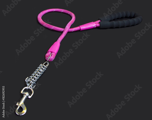 Pet supplies about leash for dog or cat on black background