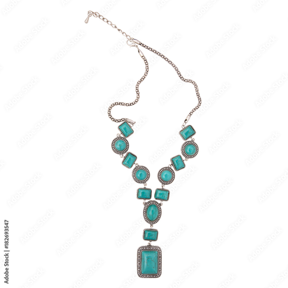 golden chain necklace with green pendent on the white background golden chain necklace with green pendent on the white background